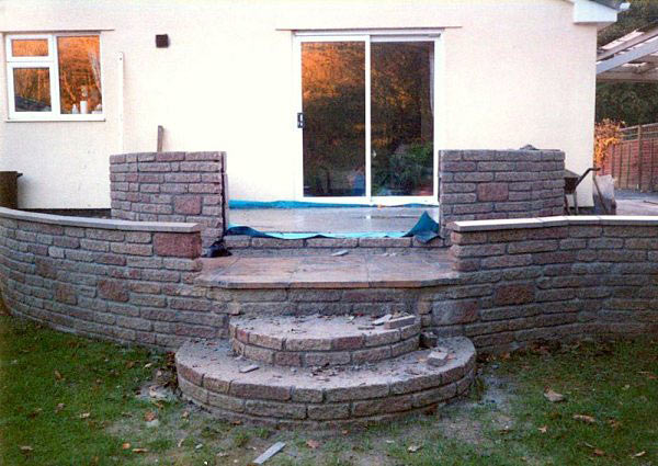 Brick base and curved steps for a new conservatory