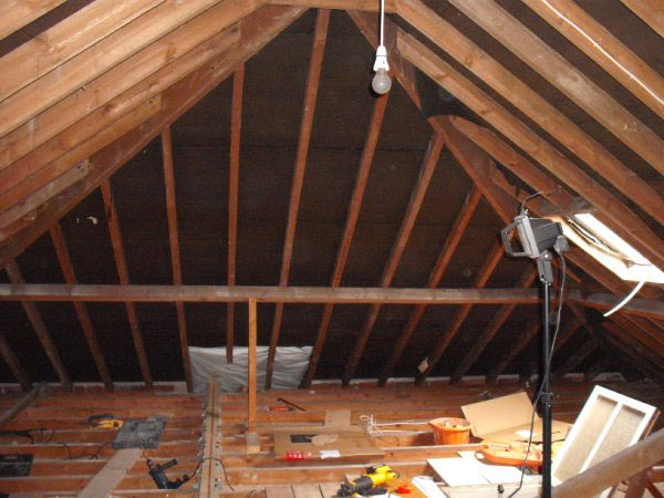 Loft floor boarded out between the rafters during a conversion