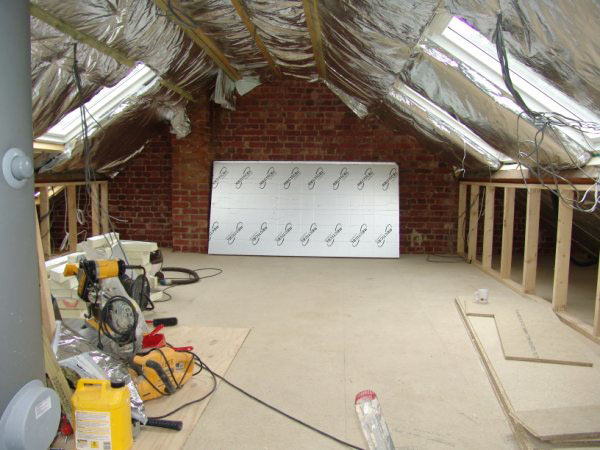 Loft insulated and boarded with stud walls going in