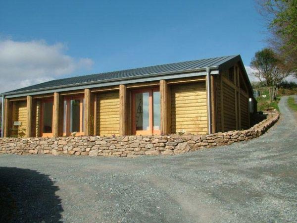 The same timber studio seen from the drive